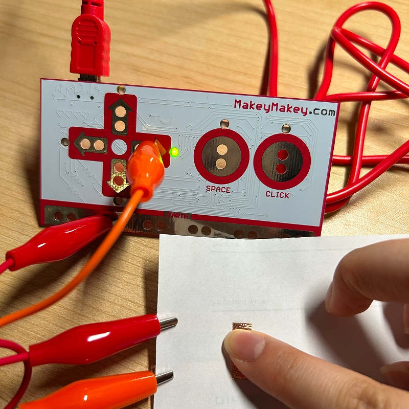 Pressing on the switch is a lot easier this way as the clips are not underneath the page.